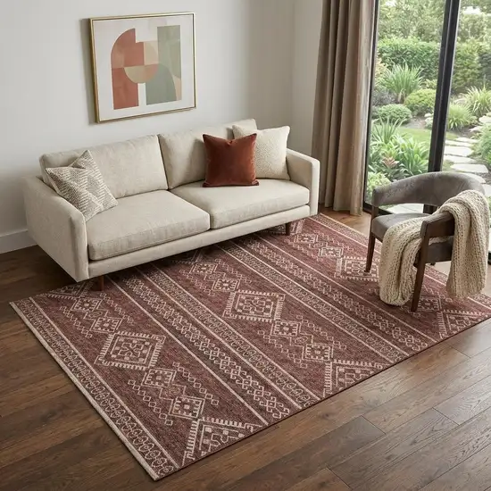 Burnt Sienna And Ivory Tribal Distressed Washable Area Rug With UV Protection Photo 1