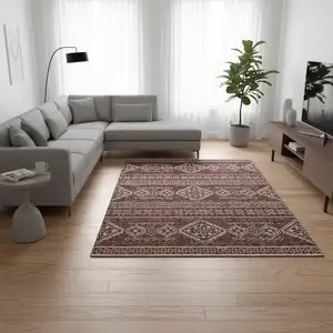 Photo of Burnt Sienna And Ivory Tribal Washable Area Rug With UV Protection
