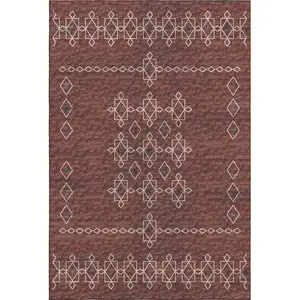 Photo of Burnt Sienna Ivory And Black Tribal Washable Area Rug With UV Protection