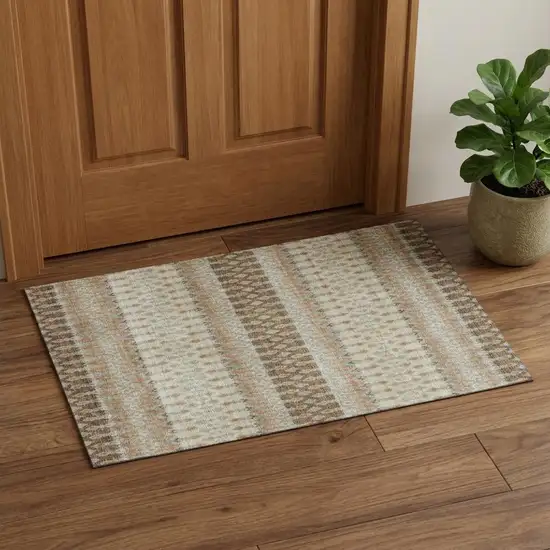 Burnt Sienna Ivory And Blue Tribal Distressed Washable Area Rug With UV Protection Photo 1