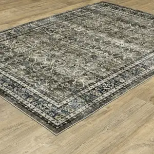 Photo of Charcoal And Blue Oriental Distressed Area Rug