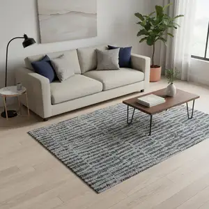 Photo of Charcoal And Gray Striped Washable Area Rug With UV Protection