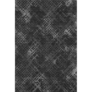Photo of Charcoal And Ivory Abstract Geometric Washable Area Rug With UV Protection