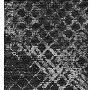 Photo of Charcoal And Ivory Abstract Geometric Washable Area Rug With UV Protection