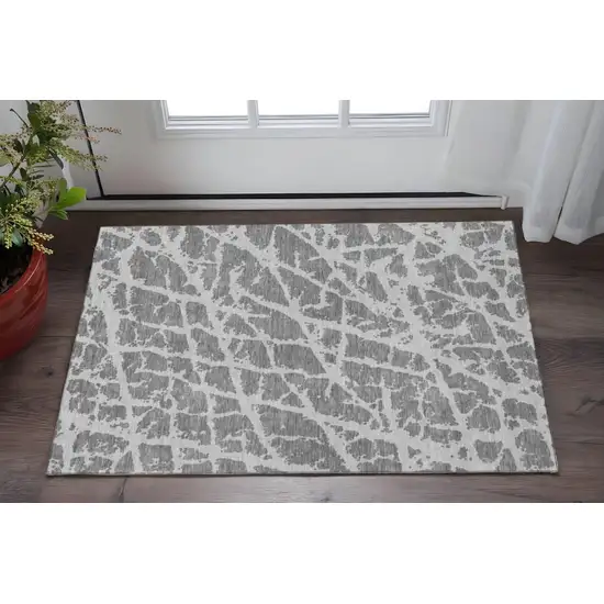 Charcoal And Ivory Abstract Washable Area Rug With UV Protection Photo 2