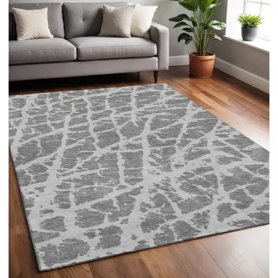Charcoal And Ivory Abstract Washable Area Rug With UV Protection Photo 2