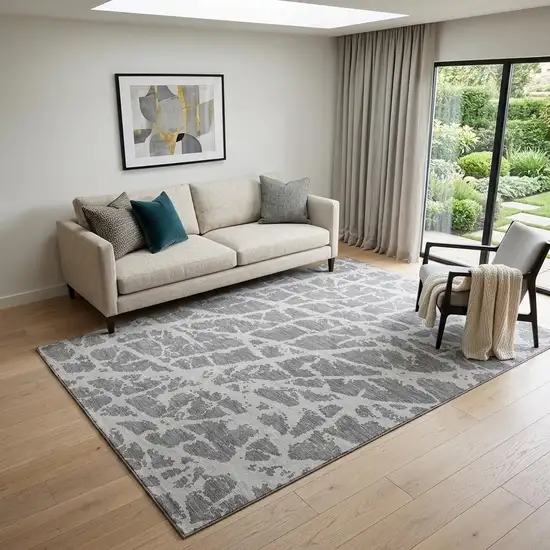 Charcoal And Ivory Abstract Washable Area Rug With UV Protection Photo 1