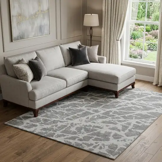Charcoal And Ivory Abstract Washable Area Rug With UV Protection Photo 1