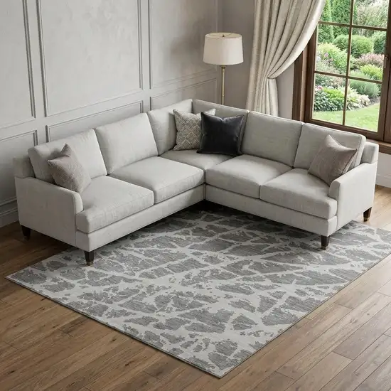 Charcoal And Ivory Abstract Washable Area Rug With UV Protection Photo 1
