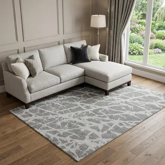 Charcoal And Ivory Abstract Washable Area Rug With UV Protection Photo 1