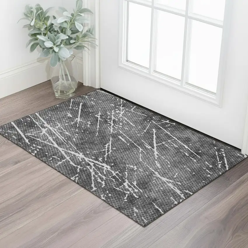Charcoal And Ivory Abstract Washable Area Rug With UV Protection Photo 1