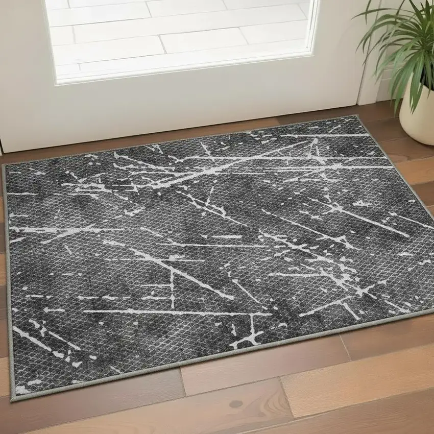 Charcoal And Ivory Abstract Washable Area Rug With UV Protection Photo 2