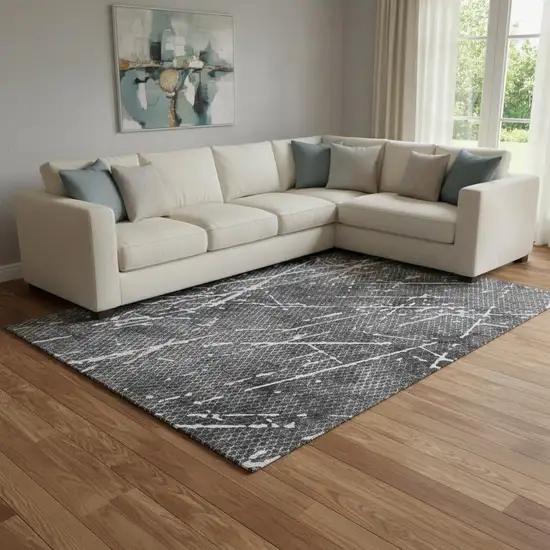 Charcoal And Ivory Abstract Washable Area Rug With UV Protection Photo 1