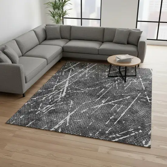 Charcoal And Ivory Abstract Washable Area Rug With UV Protection Photo 2