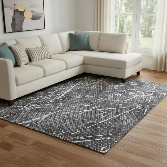 Charcoal And Ivory Abstract Washable Area Rug With UV Protection Photo 1
