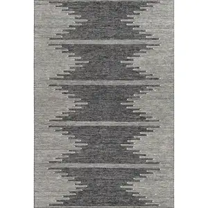 Photo of Charcoal And Ivory Abstract Washable Area Rug With UV Protection