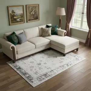 Photo of Charcoal And Ivory Floral Distressed Area Rug