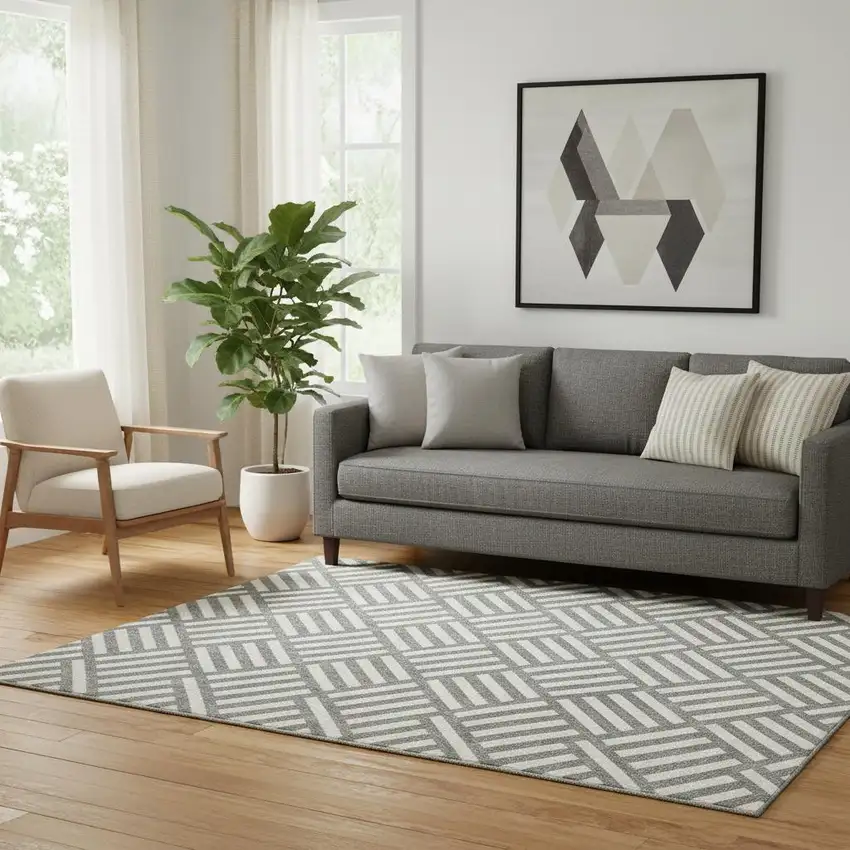 Charcoal And Ivory Geometric Washable Area Rug With UV Protection Photo 1