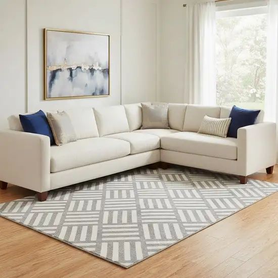 Charcoal And Ivory Geometric Washable Area Rug With UV Protection Photo 1