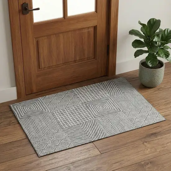 Charcoal And Ivory Geometric Washable Area Rug With UV Protection Photo 1