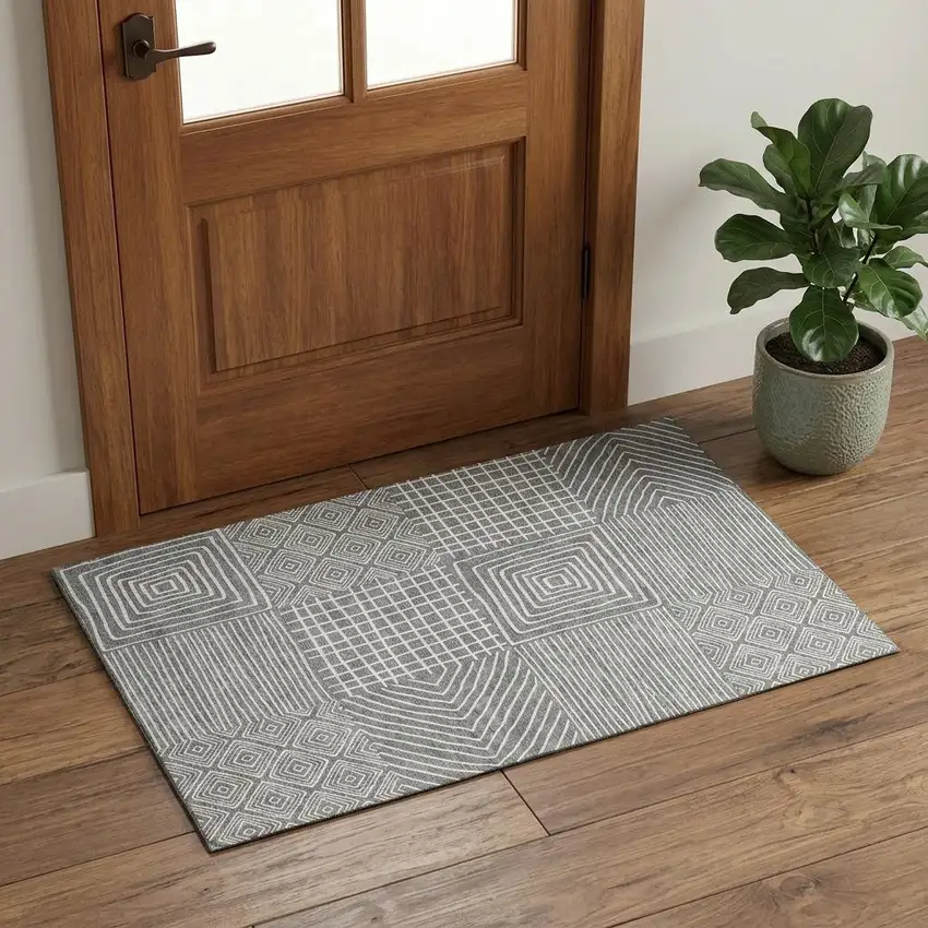 Charcoal And Ivory Geometric Washable Area Rug With UV Protection Photo 1