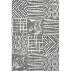 Photo of Charcoal And Ivory Geometric Washable Area Rug With UV Protection