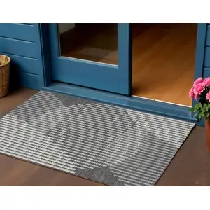 Photo of Charcoal And Ivory Geometric Washable Indoor Outdoor Area Rug