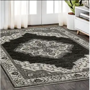 Photo of Charcoal And Ivory Medallion Area Rug With Fringe