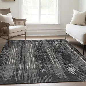 Photo of Charcoal And Ivory Striped Washable Area Rug With UV Protection