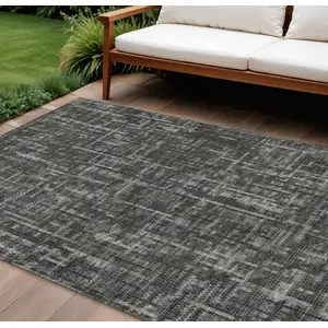 Photo of Charcoal And Ivory Striped Washable Indoor Outdoor Area Rug