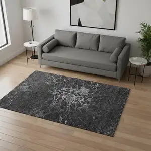Photo of Charcoal And Silver Abstract Washable Area Rug With UV Protection