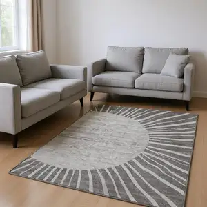 Photo of Charcoal And Silver Abstract Washable Area Rug With UV Protection