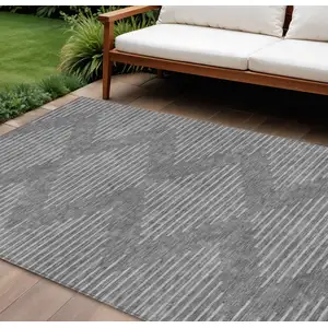 Photo of Charcoal And Silver Geometric Washable Indoor Outdoor Area Rug