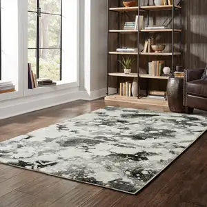 Photo of Charcoal And White Abstract Power Loom Stain Resistant Area Rug