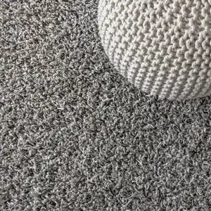 Photo of Charcoal Area Rug With Fringe