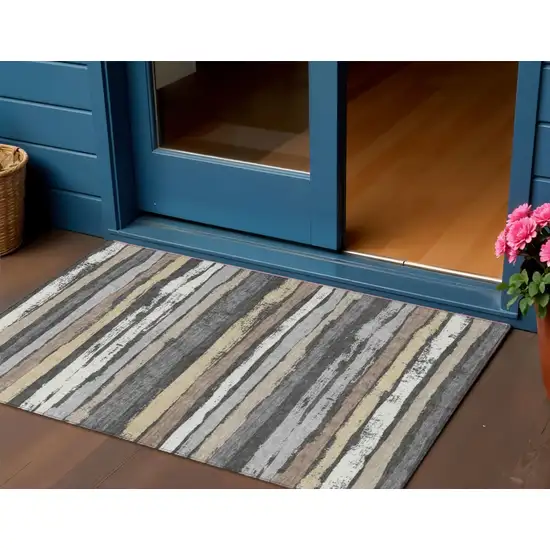 Charcoal Beige And Brown Striped Washable Indoor Outdoor Area Rug Photo 1