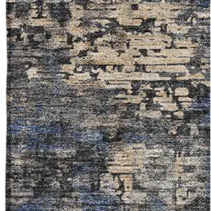 Photo of Charcoal Blue And Beige Abstract Washable Area Rug With UV Protection