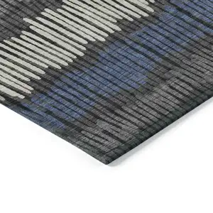 Photo of Charcoal Blue And Ivory Striped Washable Indoor Outdoor Area Rug