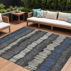 Photo of Charcoal Blue And Ivory Striped Washable Indoor Outdoor Area Rug