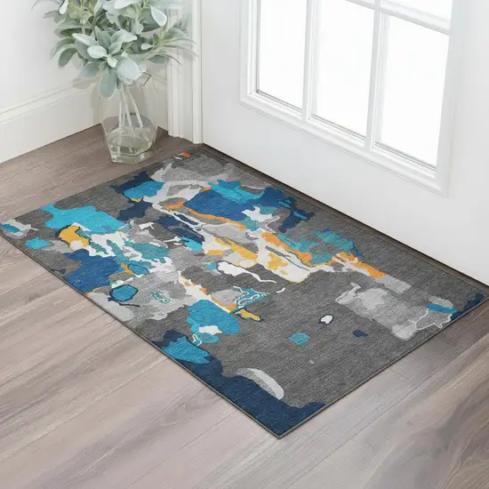 Charcoal Blue And Orange Abstract Washable Area Rug With UV Protection Photo 2