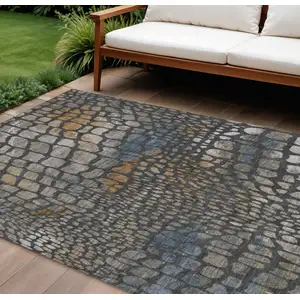 Photo of Charcoal Brown And Copper Abstract Washable Indoor Outdoor Area Rug