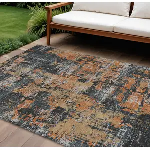 Photo of Charcoal Copper And Ivory Abstract Washable Indoor Outdoor Area Rug