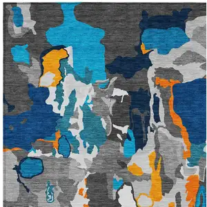 Photo of Charcoal Copper And Teal Blue Abstract Washable Indoor Outdoor Area Rug