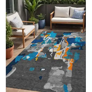 Photo of Charcoal Copper And Teal Blue Abstract Washable Indoor Outdoor Area Rug