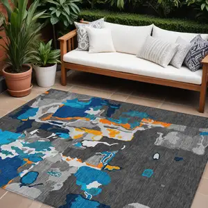 Photo of Charcoal Copper And Teal Blue Abstract Washable Indoor Outdoor Area Rug