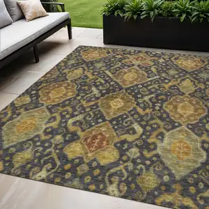 Photo of Charcoal Gold And Copper Ikat Washable Indoor Outdoor Area Rug