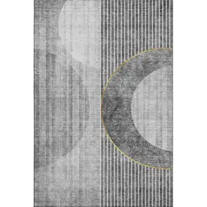 Photo of Charcoal Gold And Silver Geometric Washable Area Rug With UV Protection