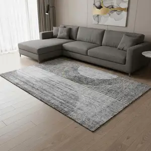 Photo of Charcoal Gold And Silver Geometric Washable Area Rug With UV Protection