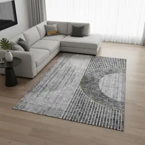 Photo of Charcoal Gold And Silver Geometric Washable Area Rug With UV Protection