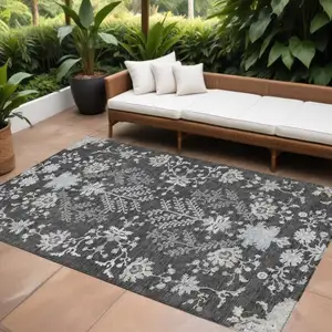 Photo of Charcoal Gray And Beige Floral Washable Indoor Outdoor Area Rug